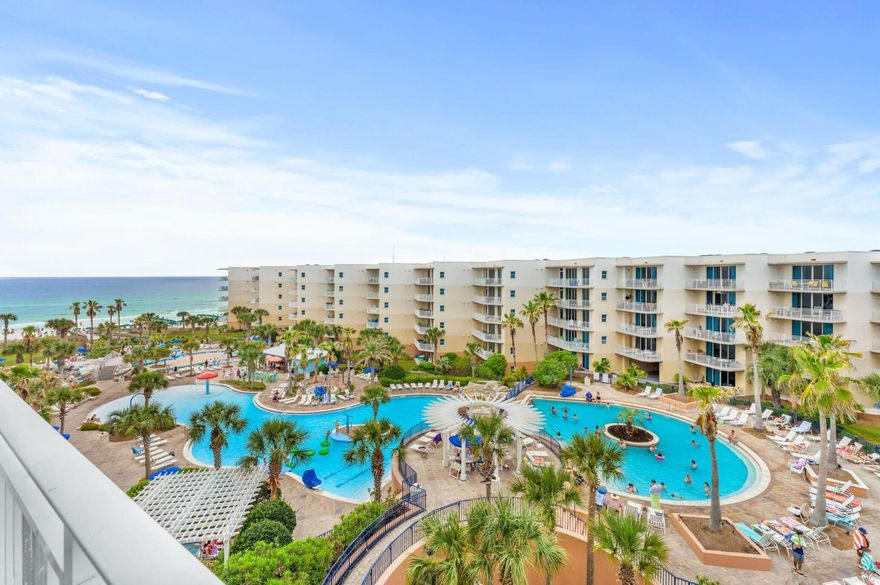 Waterscape is one of the most popular resorts in the Destin/Fort Walton Beach area. This resort boasts one of the best beachfront pool decks on the Emerald Coast, with 490' of beachfront shoreline.  The complex has multiple pools with waterfalls (one pool heated seasonally), lily pad course, waterslide, lazy river, splash pad, 2 hot tubs, poolside gas grilling, and it's all BEACHFRONT!  The family friendly pool decks provides solid rental revenue year after year.  Great investment!  This is a 2 bedroom unit, with an additional bunk room, plus 2.5 baths.  Unit has been fully remodeled with new kitchen, flooring, and upgrades.  The unit faces the pool deck and has beautiful views of the Waterscape grounds and the Gulf of America.Conveys fully furnished.  Owners closet included.