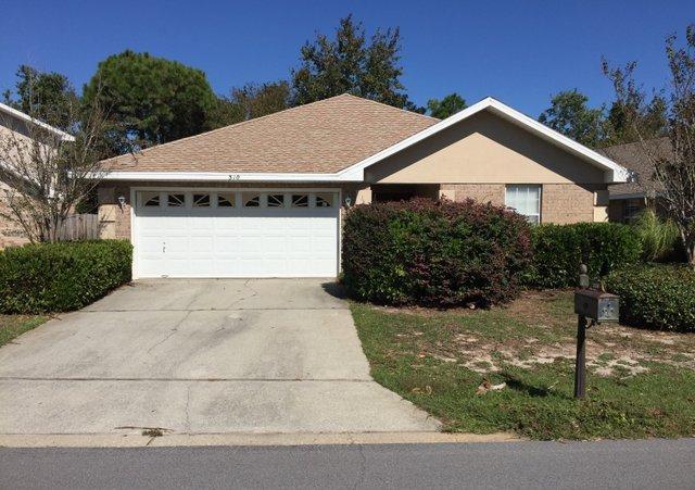 REO ~ Wow...! Don't miss this awesome opportunity in Emerald Lakes. This 4 Bd / 2 Ba all brick home offers an open living, dining & kitchen area. The kitchen features breakfast bar & the living / dining area has gas fireplace & vaulted ceilings. French doors lead from the living room to a covered back patio. Emerald Lakes is a gated community with many amenities including pool, playground, tennis courts & much more. Conveniently located to shopping, dining & the beach!
