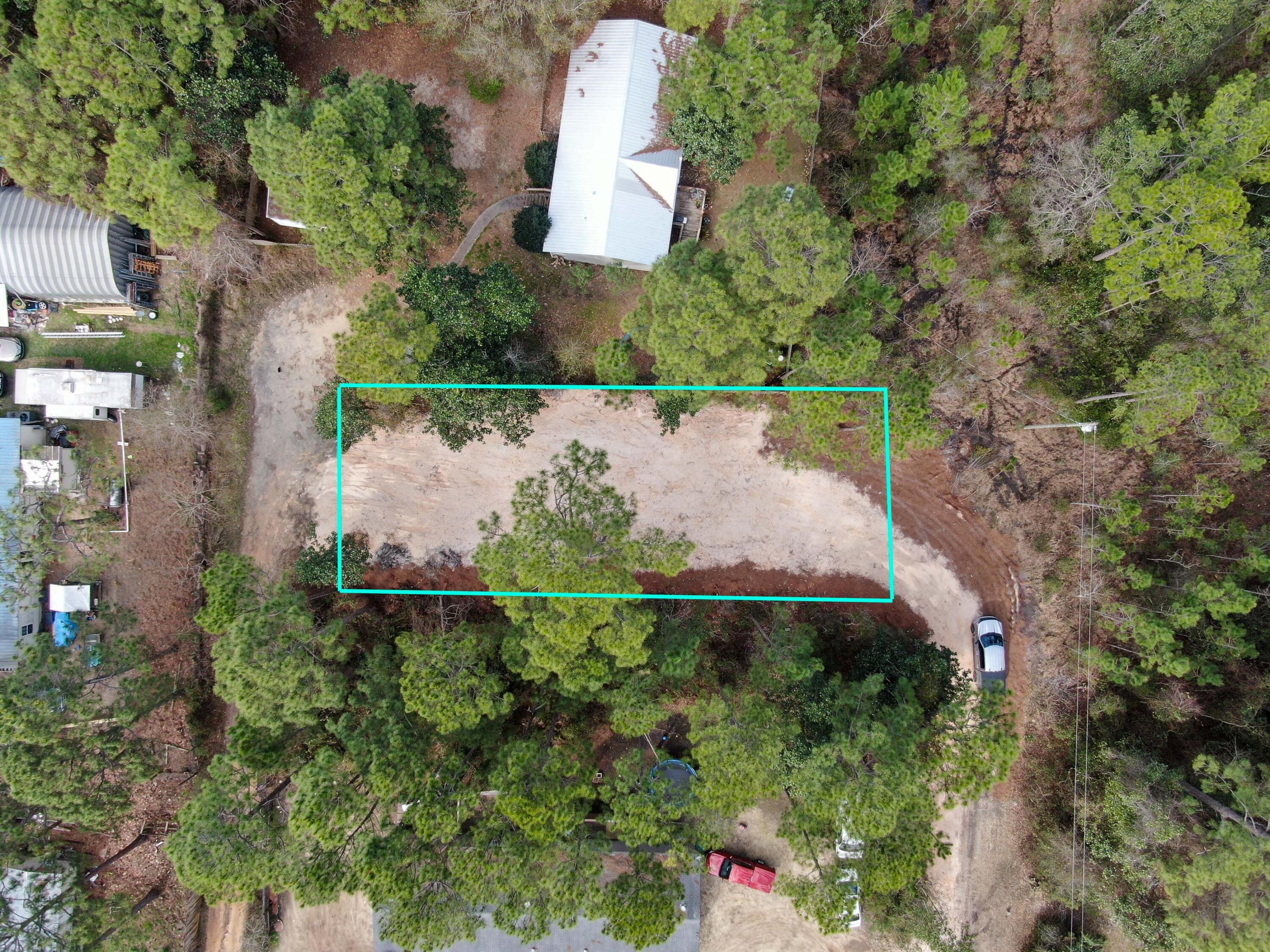 This lot is ready for a tiny home. The seller has cleared the lot and done the hard work to get it ready for the next owner. Priced to sell. Centrally located to everything. It is a half mile from Co Hwy 393. From this intersection water access and recreation is in every direction. Cessna Landing is 1 mile North with a boat launch and access to Hog Town Bayou. Just a few more miles to the East and you will discover Pilcher Park and Grady Brown Park. Both parks serve the community with full-service boat launches and access to Choctawhatchee Bay and the Intercoastal Water Way. If you prefer a day on South Walton's Famous Beach, Ed Walline Beach Park is 3 miles