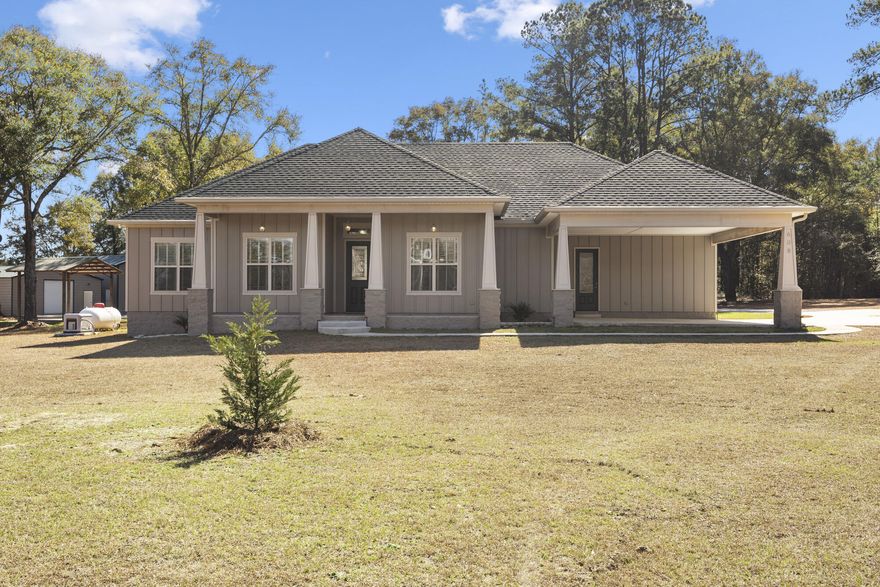 Picture-perfect custom-built home on 10 beautiful acres. Hardiplank siding w/brick exterior. Seamless gutters w/leaf guards.  Whole house gas generator, Gas FP, tankless gas water heater, 10 ft ceilings, LVP flooring. Wolf gas stove, KitchenAid dishwasher, custom kitchen cabinets, w/quartz counter tops, island breakfast bar and nook.  Split floor plan. The master bedroom has private access to the screened porch that leads to the gazebo and jacuzzi hot tub.  Property is a mixture of pasture, fruit trees, manicured oaks, a fenced garden area and an enclosed chicken coop. The 30x40 workshop includes a commercial grade roll up door, shelving and electricity.  The 20x40 RV barn has two commercial grade roll up doors, one at each end of the barn.   Show by appt.  24 hours' notice require