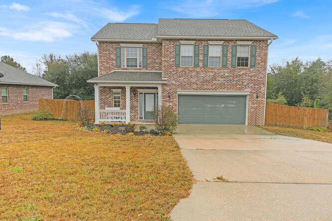 Wonderful home in south Crestview on a dead end street. Upon entering you are greated by a foyer with wood flooding through the foyer is a great room with carpet, opening up to a wonderful kitchen featuring granite counter tops with breakfast bar, 36 inch tile, maple upper cabinets with crown molding. Upstairs you will enjoy the loft, all the bedrooms are upstairs and a hall bath. The laundry is also located upstairs so you don't have to carry laundry up and down the stairs! Relax in your spacious master offering double vanity, separate shower, garden tub, porcelain tile floor.