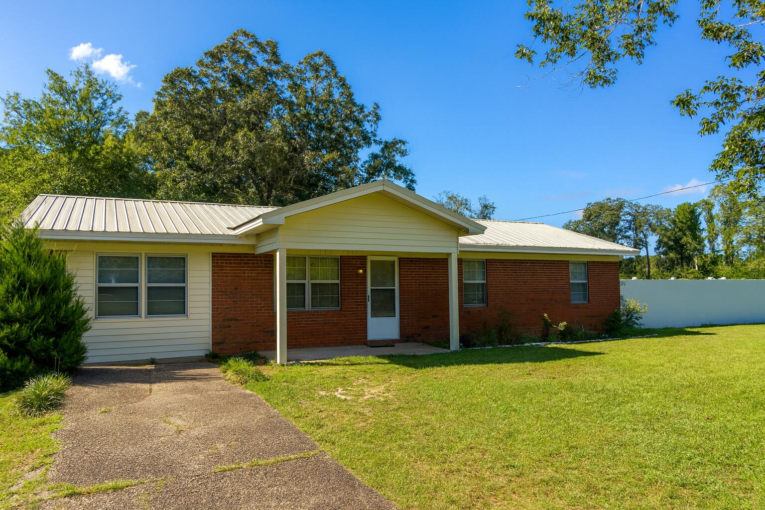 Located on the north end of Crestview, this 3-bedroom, 2-bath home features 1,999 square feet of living space, a versatile bonus room, and a spacious 0.43-acre lot with a fenced-in yard. Key highlights include a metal roof and a 2018 HVAC system, providing a solid foundation for your future plans. With convenient access to local bases, shopping, and the beaches, this property is an ideal investment opportunity or the perfect chance to create your dream home. Schedule your showing today! All measurements to be verified by buyer