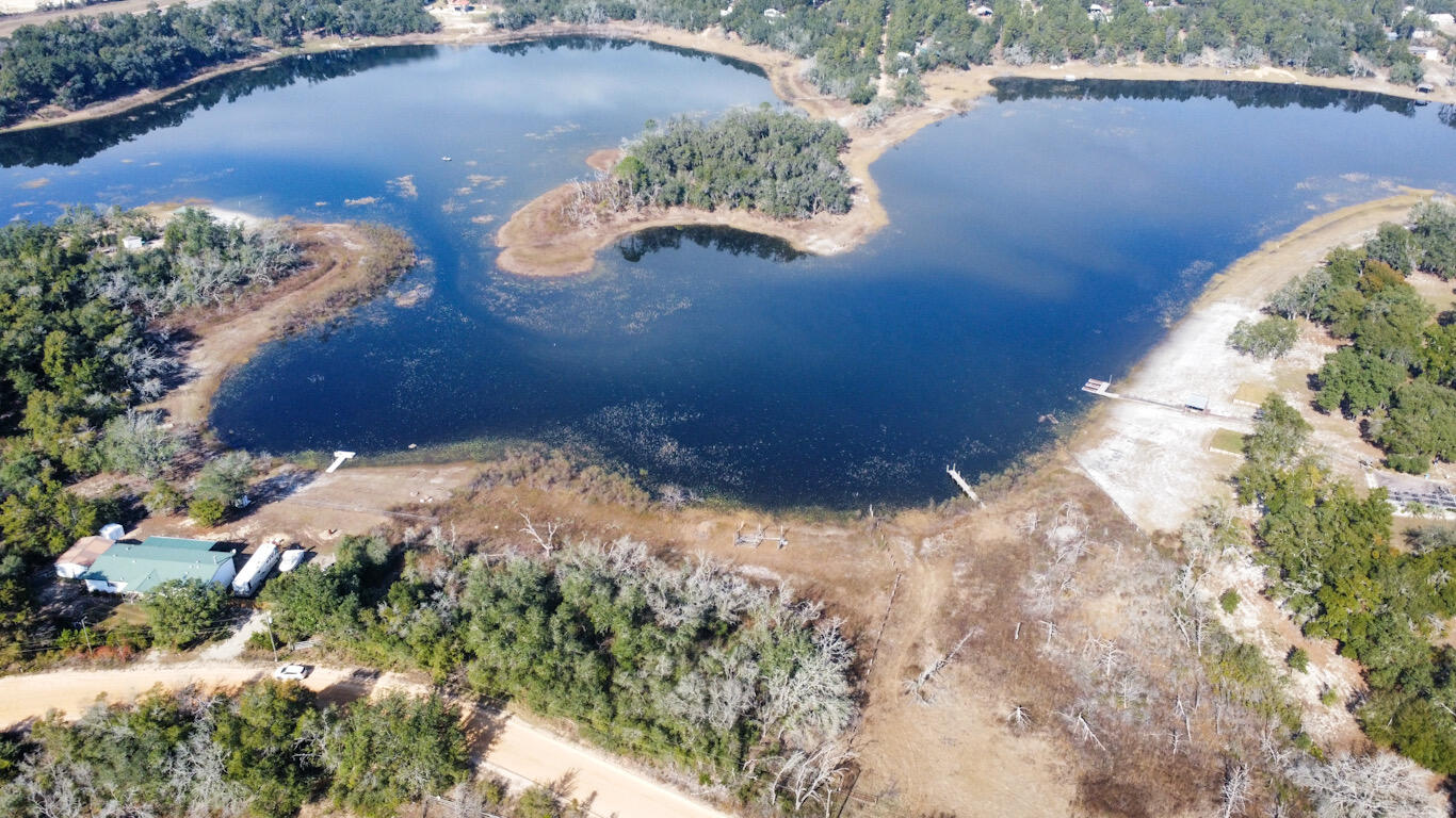 Waterfront lot! This lot is wide giving you more waterfront feet to enjoy. Motorized watercraft's are welcome so bring your jet ski's or boat. River Lake is situated just North of Hwy 20 giving easy access to Panama City beaches or a quick 15 mile drive in to town. Call today!