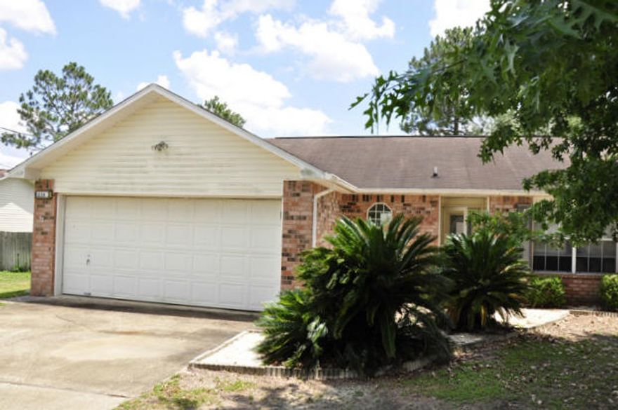 REO. There is much to appreciate about this home! This home is located in a quiet neighborhood and conveniently located south of I-10. Some features of this home include a cathedral ceiling in the living room, split bedroom floorplan, eat-in kitchen, and pantry. The living room also boasts French doors that lead out onto the screened porch. The exterior of the home features brick siding on the front and white vinyl siding on the other sides. Call today to see this home! Being sold AS IS.