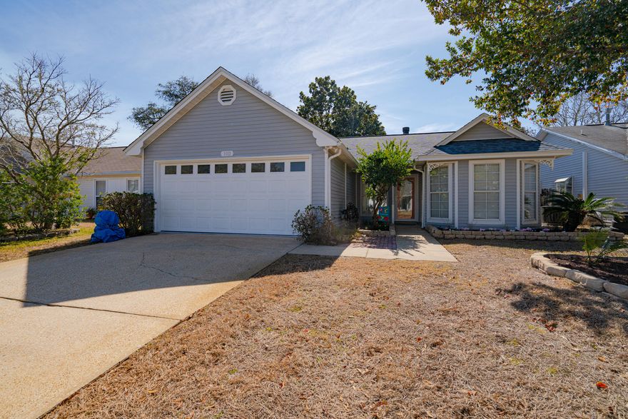 Welcome to your next home move-in ready! As you pull into the driveway you will appreciate the front garden and NEW ROOF! The front door opens up into a massive tile floor living room accompanied by a wood burning fireplace. Off to the right side you will find the split bedrooms with a perfect full bathroom and tub in the attached hallway. The blinds, carpet, shower heads, and toilets are all NEW! The kitchen boasts granite countertops, tile flooring, and up to date appliances. The master is perfect for those that love natural lighting in the morning and the feel of fresh, new carpet under their feet before heading to the shower! Other highlights that speak for themselves: stunning back deck, hvac 2 years old, roof NEW, and carpet NEW!