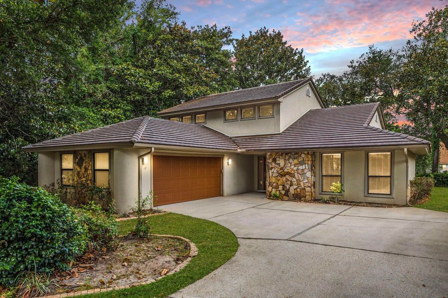 **STUNNING** MUST SEE!! Nestled in the beautiful and highly sought-after neighborhood in the heart of Bluewater Bay, this fabulous golf course villa checks all the boxes! 4 Bedrooms, 3 full baths, split floorplan with a 2 car garage all with a peaceful VIEW of the WATERWAY to enjoy while sipping on your morning coffee. The exterior boasts a 50-year CEMENT ROOF, stucco and STONE accents as well as a screen in LANAI. Inside you will be greeted with 2 story VAULTED ceilings, a built-in media center and gas FIREPLACE. LARGE kitchen with eat in area, ISLAND, counter height seating, and ABUNDANT storage in the white cabinets. Primary suite has a jetted tub, separate enclosed shower and huge WALK-IN closet. Modest HOA takes care of the yard, so you get to enjoy an easy low-maintenance living.