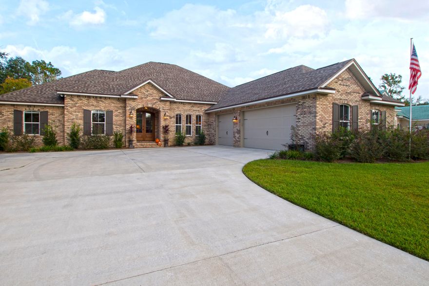 This beautiful all brick 4 bedroom 3 bath home situated on the 18th fairway of the Rocky Bayou Country Club was completed in 2016. It's custom features include an open floor plan with an inviting gas fireplace in the great room, upgraded stainless steel kitchen appliances, a gas cooktop, an oversized island, custom cherry cabinets and wood floors, and a massive 3 car garage. The separate media room, eat in kitchen, and great room have the most incredible picture windows overlooking the golf course. The master bath is in its own wing of the home offering privacy and luxury with separate walk in closets, a soaking tub and separate glass shower that will stay hot using the tankless Ranai water heater. This custom home offers all the benefits of new construction without the wait to build