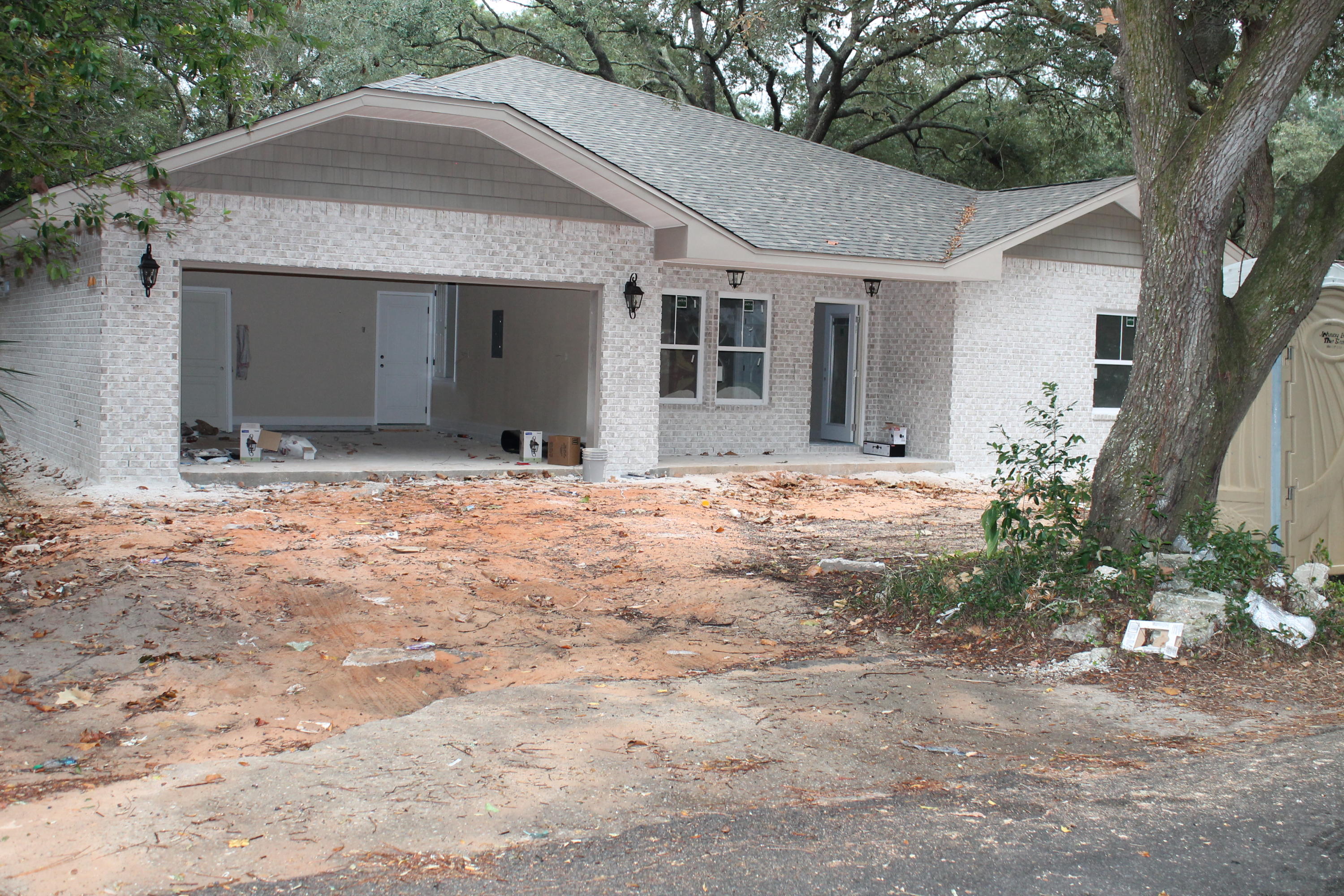 Builder pays most closing costs.....Call for details!! Awesome new floor plan, offered by a multiple award winning builder and Parade of Homes winner! Contract now to choose flooring and countertops. Home is on a large lot with beautiful mature trees which is also in a quiet neighborhood with location, location, location. This 4/3 custom brick plan has super curb appeal. There are 10 ft. ceilings w/ impressive crown molding. There will be hand scrapped hardwood flooring and and 5 1/4'' baseboard throughout the main living areas. As you enter the home from the covered porch, the formal dining room is on the right of the entry way and bedroom one is just a few feet away on the left (bedrooms 2 and 3 follow on the left of the home as well). The magnificent kitchen has 2 entry's, one from the dining room and one from the greatroom. The chef's delight kitchen boasts a breakfast bar, maple cabinetry, granite countertops, a huge pantry, and stainless appliances (including an oversized commercial grade frig./freezer). The master suite is in the rear of the home, is very roomy, has 2 large walk - in closets, a walk - in shower, a whirlpool garden tub, and a double vanity. The laundry room is conveniently located at the rear of the kitchen. The yard will be beautifully landscaped and comes complete w/ a well, sprinkler system and timer. Insurance will be very reasonable, as home is built to today's code. Home has a Taexx ''in the wall'' pest control system that is serviced from the exterior of the home, for owner's convenience. Completion is
expected in late February.