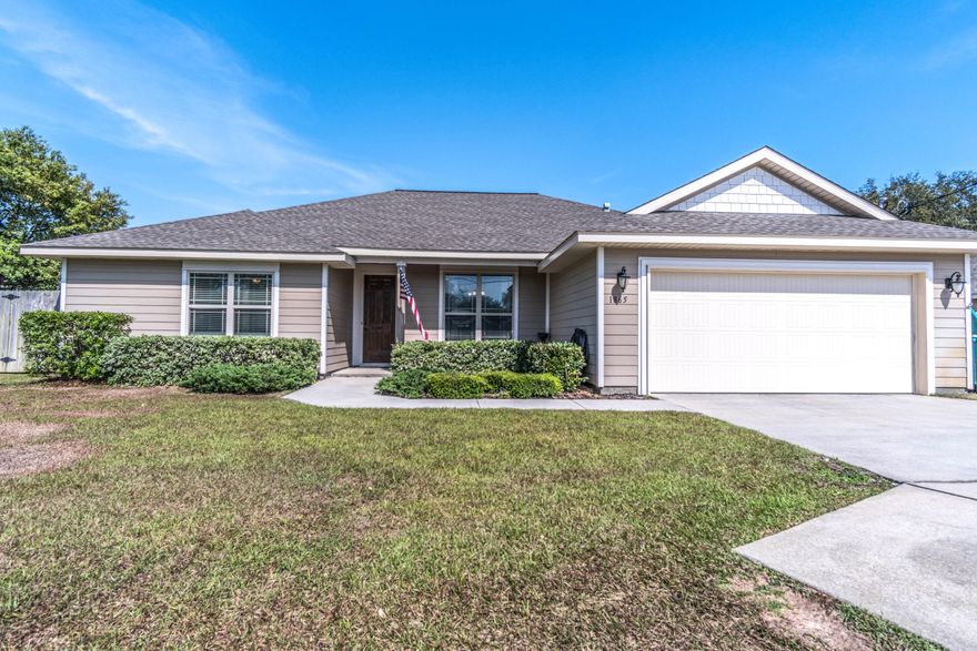 Take a look at this home in the heart of Navarre, just over the bridge from Navarre Beach. This Robbins Builders home, built in 2013, has 1942 square feet, beautiful 20'' tile flooring in the main living areas and bathrooms and laminate wood flooring in Master and front bedroom. The granite countertops, crown molding, and high ceilings create an elegant interior. The kitchen has stainless appliances, white maple cabinetry, undermount sink, and a breakfast bar open to living room. The layout is ideal for easy entertaining with both formal dining space and breakfast nook for more casual dinners. A split floorpan offers privacy in the master bedroom suite with walk-in closet, trayed ceiling with crown molding, double vanities, and separate tub/shower. Fenced in backyard with patio and