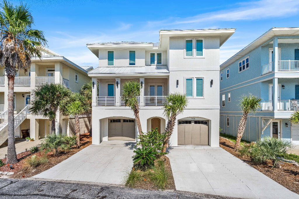 Beach and Bay Navarre -- Elegant, Brand-New Beachfront RetreatOverviewIntroducing the newest gem in Navarre Beach--Beach and Bay Navarre. This brand-new, Caribbean-inspired, contemporary home offers elevated coastal living in a gated community. With breathtaking views and lush design, this 5-bedroom, 4-bath sanctuary provides the perfect blend of modern sophistication and relaxed seaside charm.Accommodation Highlights5 Spacious Bedrooms & 4 Full Baths ideal for hosting families or groups.Sleeps 6-12 guests comfortably.Features four luxurious King bedrooms plus one bunk room with Queen-over-Queen bunks--perfect for kids or additional guests.Interior FeaturesBright, open-concept layout with soaring 9-10 ft cei