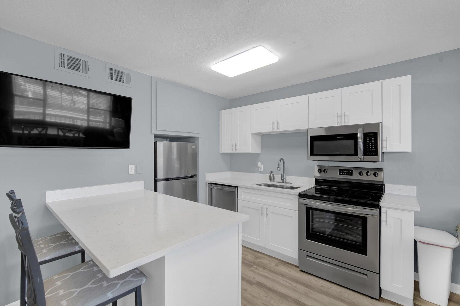 Sleeps 4 people comfortably and one of the most affordable options with gulf views on Okaloosa Island with luxury features that maximize the space and rental projections of 38k! Nestled in an exclusive location, this exquisite one-bedroom modern condo redefines coastal elegance, offering a lifestyle of opulence, comfort, and refinement. The living area exudes an air of effortless luxury, adorned with sleek finishes, high-end materials, and a neutral color palette that complements the stunning vistas of the Gulf of Mexico. The kitchen is a culinary masterpiece with an expansive master bedroom that stares at the ocean. The HVAC has been recently replaced and master bedroom has been meticulously maintained. The complex offers a community pool, nearby restaurants and entertainment.