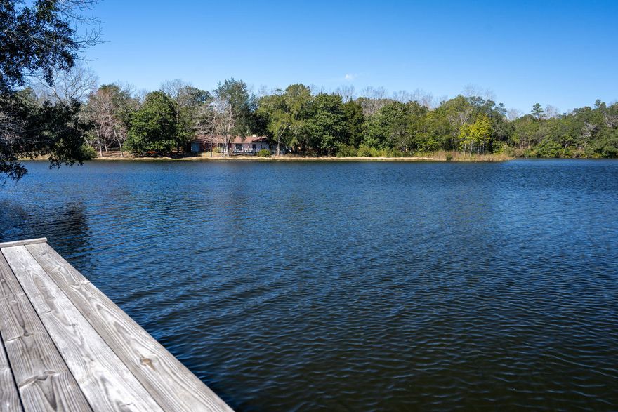 One-of-A-Kind Lake front estate! This gorgeous Spanish style villa features 4 bedrooms, 3.5 baths, with over 3400 square feet of living space (2456 upstairs and a 960 square foot walk-out basement). The property consists of nearly 2 acres of beautiful Spanish moss laden oaks, azaleas, and palmettos with 172' of water frontage and private dock on Lake Sharon. Fish from your own dock or sit and admire the heron and other wild life. This house has the potential to be one of the most unique and stunning properties along the Emerald Coast, but it needs someone with vision to lovingly restore it. Recent appraisal valued it in the $470's as it is presented now. With some renovation and sweat equity, this property would be STUNNING. Being sold ''As-Is'' and seller has completed a professional inspection report and addressed most of the issues identified. Call your Realtor TODAY to schedule an appointment!