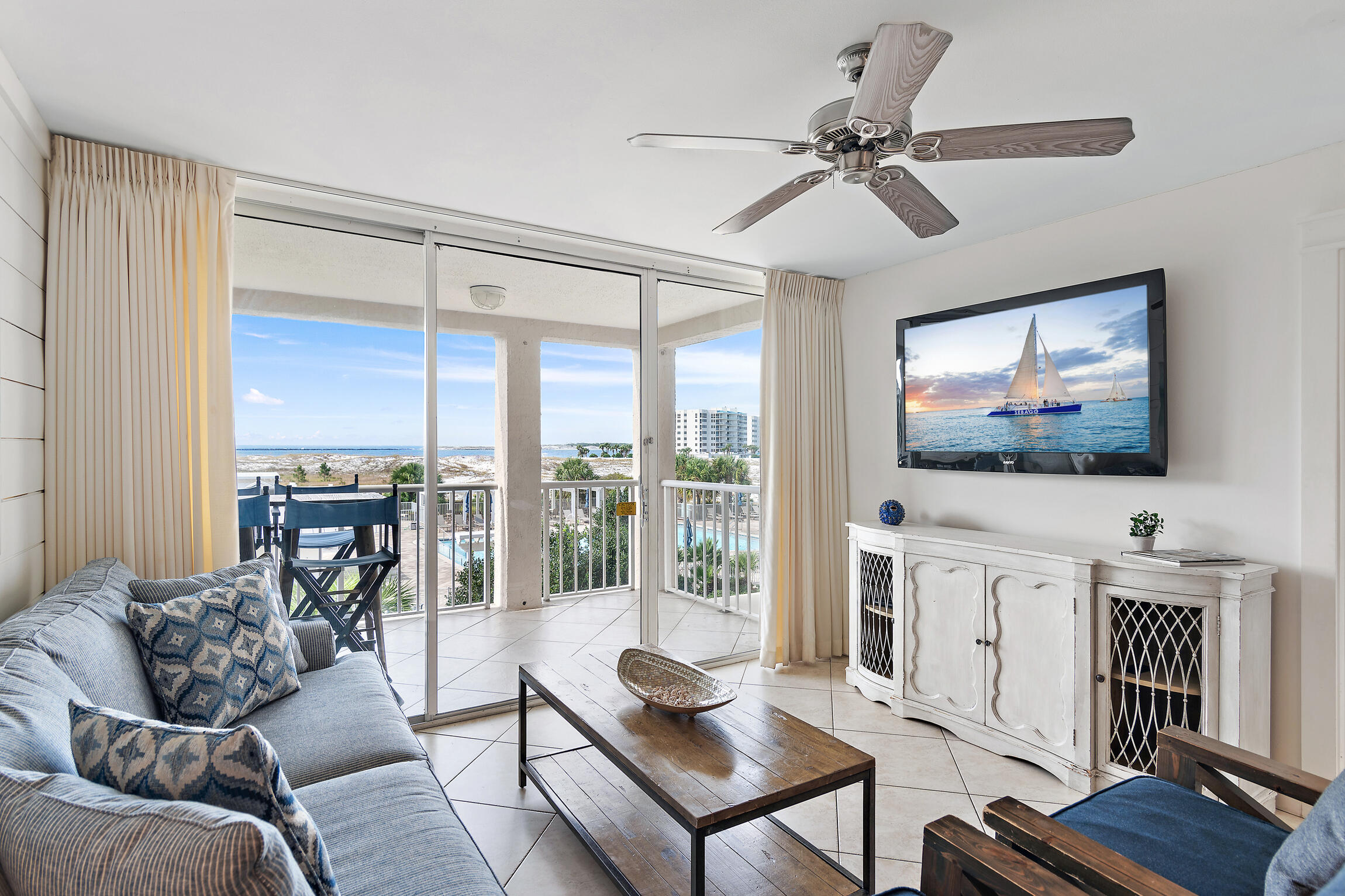Perfect mix of serenity and great investment opportunity at this gulf front mid rise condo unit located in a family gated community. Relax on the balcony overlooking the pool and gulf/pass in this beautifully decorated condo that sleeps 6-8 people. The community offers tennis, shuffle board, 3 community pools, and more than 3000 feet of beach frontage. 24 hour security and great views of the pass, harbor and coastal dune lake.