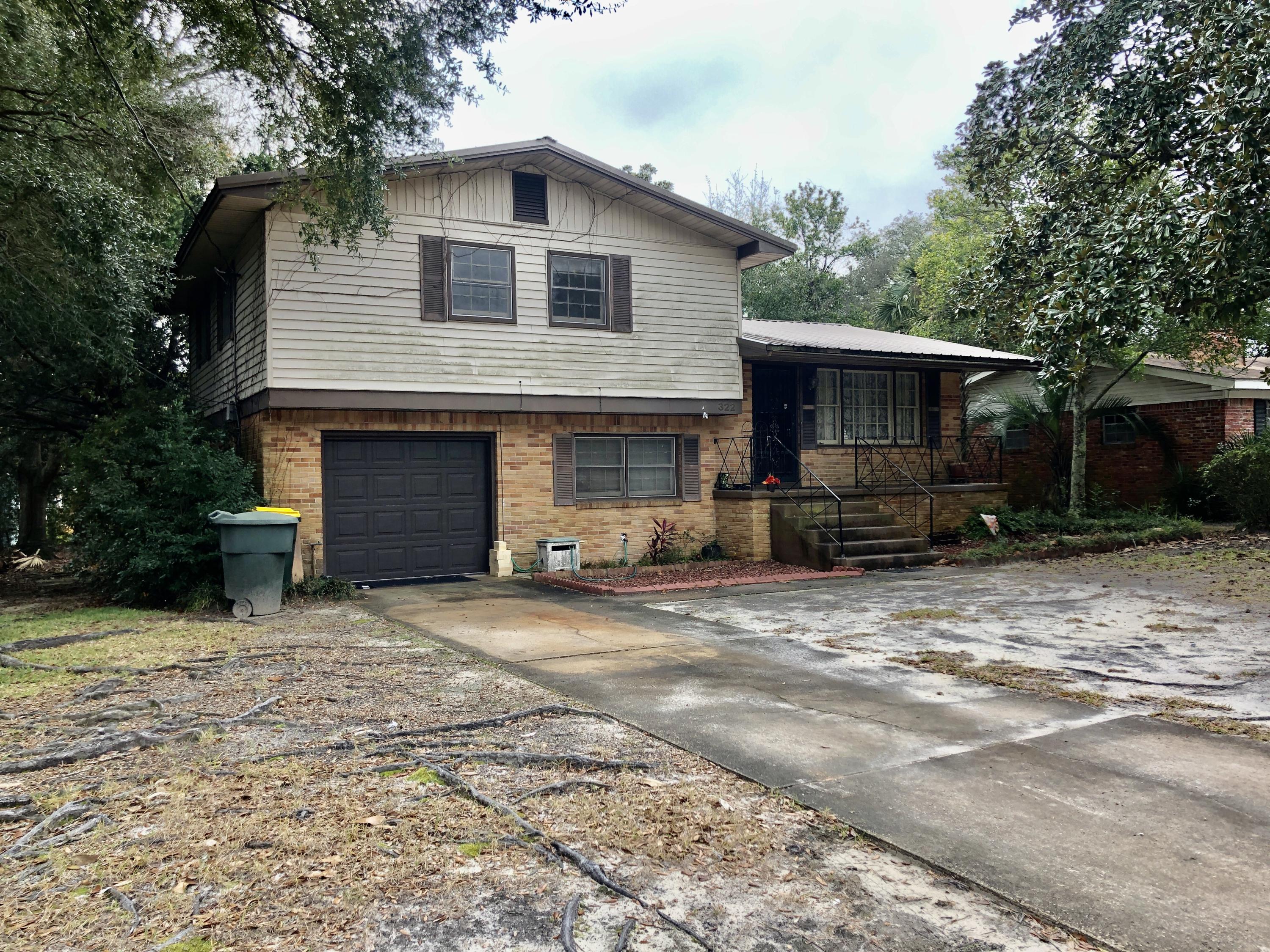 Attention Investors: Great location in Fort Walton Beach - peaceful neighborhood on a beautiful street. This property needs some TLC - but with a few upgrades and improvements - it could be a sweet home for a family - or a great investment property to rent.