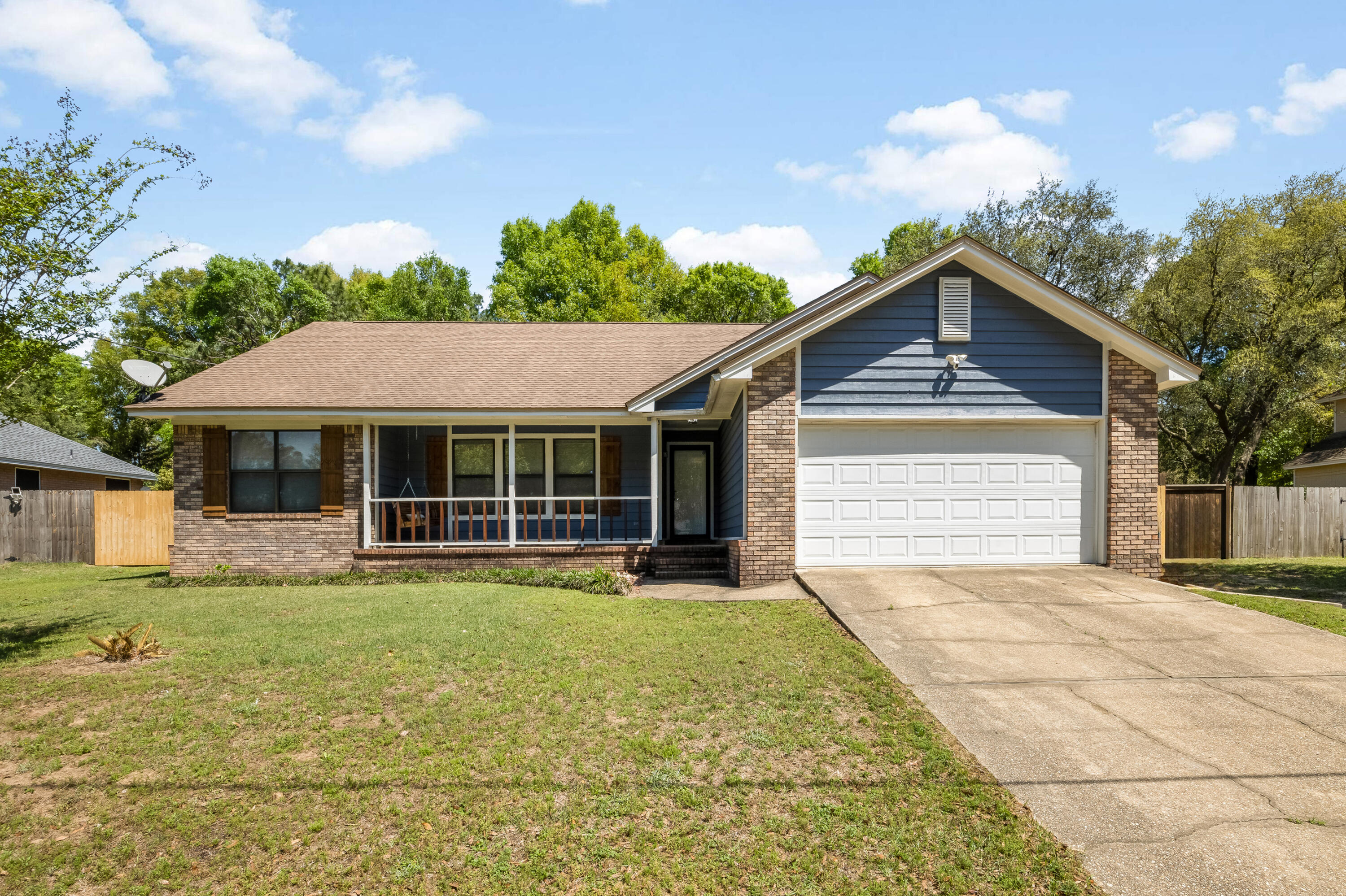 VERY MOTIVATED SELLERS!!! Are you looking for a beautiful, three bedroom, two bathroom home, south of I10?? Well look no further, this home offers an ample amount of space with just shy of 1,700 square feet of heated and cooled space! Featuring all stainless steel appliances in the kitchen, along with all new tile back splash all the way around. Walking into the living area, you will notice a custom accent wall, wood flooring, continue past and there is a den with built in book shelves and a gas burning fireplace. There are several windows all throughout the home for plenty of natural light. The master bedroom is very spacious, including a walk in closet, the master bathroom has a new double vanity sink and new light fixtures! With an amazing Florida room off the back of the home, come view this great house today so you can see all the upgrades and value it has to offer new owners!!!