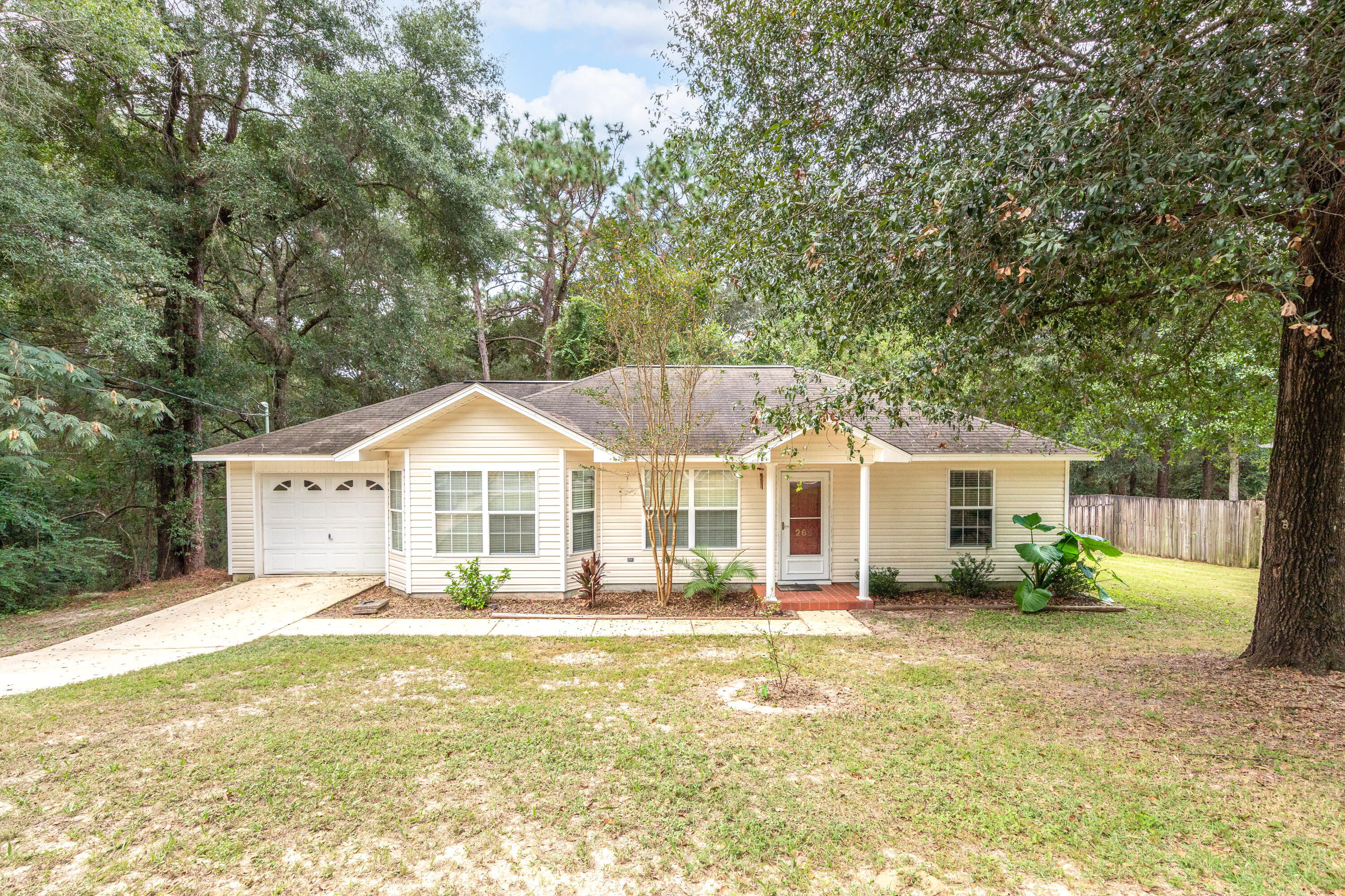 HOT HOT HOT! This beautifully updated 3 bedroom 2 bath features new vinyl plank flooring throughout living room and kitchen, new counter tops, and kitchen cabinets. The house has been well maintained offering a 2019 HVAC and 2020 Hot Water Heater. The split floor plan is separated by the spacious living room and kitchen that provides the best use of space for family or entertaining. The back yard is fully fenced in as well. Hands down the best house under in the price range!