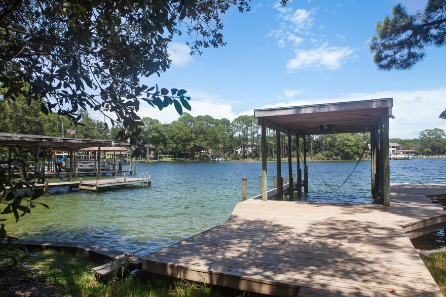 Poquito Bayou waterfront home and lot. Owner currently rents the property short term/weekly. Viewings will be limited to time of vacancy between tenants. Seller will consider offers contingent on future viewing/approval. The home features high ceilings and lots of glass along the back allowing plenty of natural light and great views of the bayou. The lot has lots of mature landscaping and trees giving it a very private and secluded feeling. Lot is high and not in a flood zone. Beautiful bayou views from many rooms inside the home and from the large deck. This three bedroom home has been maintained and improved by the current owner to include newer roof and paint. The new dock and covered lift completed in 2018.