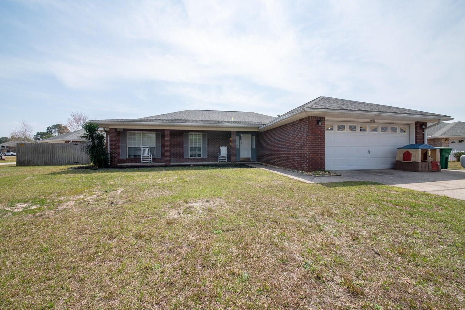 This 4 Bd/2ba Navarre home has a fantastic lay out that boasts a flex room that can be used as 4th bd or office, PLUS a Fl room (not included in the sq ft), and it's close to both Hurlburt Field and Navarre Beach! Features include a split floor plan, large kitchen w/plenty of cabinetry and new quartz counters and a pantry, vaulted ceilings and more! Outside, there's a covered front porch, privacy fenced backyard and a roof that's less than 5 years old! Creetwood Place S/D is a well-maintained community with no Homeowner's dues and has underground utilities and is located close to shopping, dining, and other local activities, but most importantly it's only a 5 min or so car ride to some of the most beautiful white sand beaches in the world! *seller is licensed Realtor in another state*