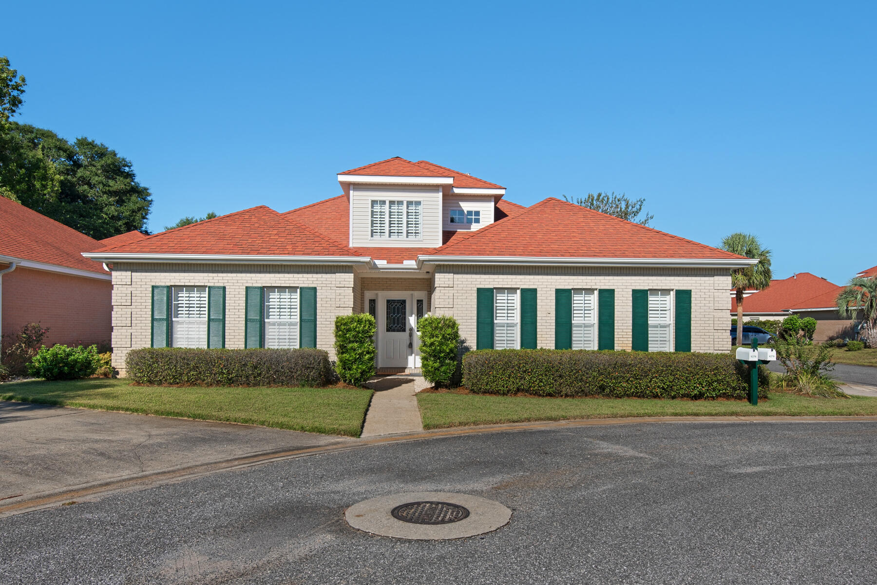 Super location and quality construction are found within this 3 bedroom, 2 bathroom home tucked inside the exclusive gated community of Magnolia Plantation. Luxury wood plank floors throughout most of the home, tile in the bathrooms and kitchen.   The flowing floor plan is functional and welcoming. Highlights include: gas fireplace, crown moulding, split-tilt plantation shutters (lets you open the top louvers for light and keep the bottom louvers closed for privacy)and recessed lighting. The cook's kitchen is ready to handle all types of cuisine with electric appliances, breakfast bar, solid surface counter-tops, bar height breakfast bar,  tile backsplash and pantry. The dining area is located just off the kitchen which is open to the living space. The master suite is generous in size with