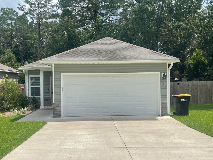 Gorgeous 2020 built three bedroom, two bath home in the heart of Niceville! Easy commute to bases, beaches, schools, shopping, and more. This home features beautiful flooring and upgraded finishes and fixtures throughout, and the owner is having it freshly painted for you. There is a privacy fenced backyard as well as a two car garage & laundry room. The floor plan is open with a spacious living room,  full kitchen with stainless appliances, breakfast bar, pantry, and plenty of counter/cabinet space as well as a formal dining area. The primary bedroom has its own en suite. Two nicely sized guest bedrooms share a full bath. Pets may be considered on a case by case basis of the prior owner approval on a nonrefundable pet fee. No smoking, including vapes.