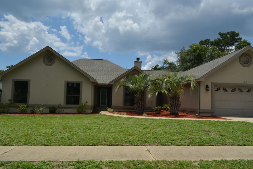 FRESHLY PAINTED INTERIOR! Plenty of space and wonderful architectural features abound here. Large kitchen with breakfast nook, formal dining room, 2 living areas that have a double sided fireplace facing both the formal living room and the family room. Wood laminate flooring, tile in bathrooms. New roof in 2006, crown and chair rail in formal dining room, and stainless steel appliances in kitchen (refrigerator included!). Plus enjoy the outdoors in the Florida room (not counted in square footage) or on the NEW 10 x 20 deck in the backyard.