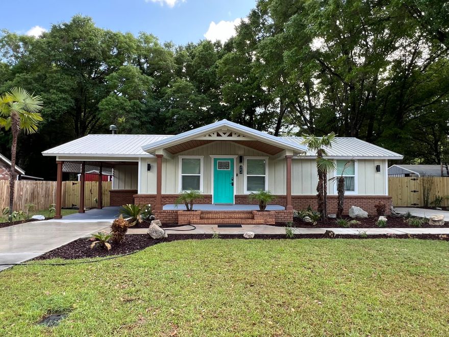 This home is stunning! A fantastic remodel with classic craftsman updates throughout. Originally built in 1942, the new effective age of this home due to the remodel is 2015. Home has vaulted ceilings in the living room, shiplap throughout, electric fireplace, recessed lights, LVP flooring throughout and so much more. Real brick accents in the kitchen area add to this homes appeal. Stainless steel appliances along with 2 toned soft close doors and drawers with quartz tops make this kitchen shine. The master bedroom is massive with double barn doors for the closet as well as double barn doors to the master bath and a small shoe closet for handy storage. Home has metal roof, tankless gas water heater, new hvac, foam insulation in the attic and floor space. So much here makes this a must see