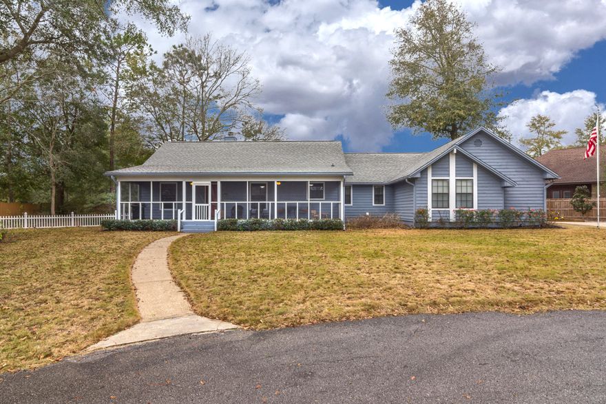 Wonderful South Crestview home! The beautiful Kitchen boasts quartz countertops, custom backsplash, stainless steel appliances and extended breakfast bar. Updated laminate wood flooring throughout, tile in Kitchen and Master Bath; wood burning fireplace, ceiling fans, recess lighting, and freshly painted bedrooms. The heated and cooled sunroom brings in the natural light and is the perfect place to relax. The Master Bedroom has ledge lighting, access to the sunroom, and a wonderfully updated Master Bath with granite countertops, whirlpool tub, and separate shower. Oversized garage (2 car plus golf cart -679 sq ft!) with workbench and peg boards just waiting for your tools! Sit back and relax on the screened in front porch (280 sq ft!) and enjoy this wonderful home! Buyer to verify all in