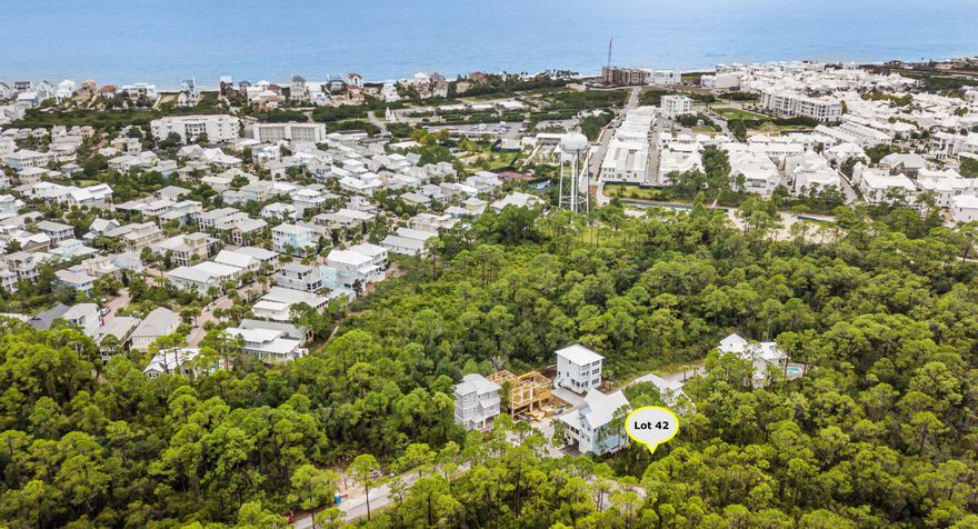 One of the larger lots with driveway access from two streets. Wooded cul de sac lot. Do not miss out on this great opportunity to build in Treetop Village, a private gated community South of 98 comprised of large wooded lots with private gated access to to 30A through Seacrest Beach neighborhood. Treetop Village has a beautiful community pool and deeded beach access. Tram service is available for an small annual fee. There is no build out time. You are close to all 30A has to offer and adjacent to Rosemary Beach and Alys Beach! Bike along 30A, enjoy area shopping, concerts, and dining.