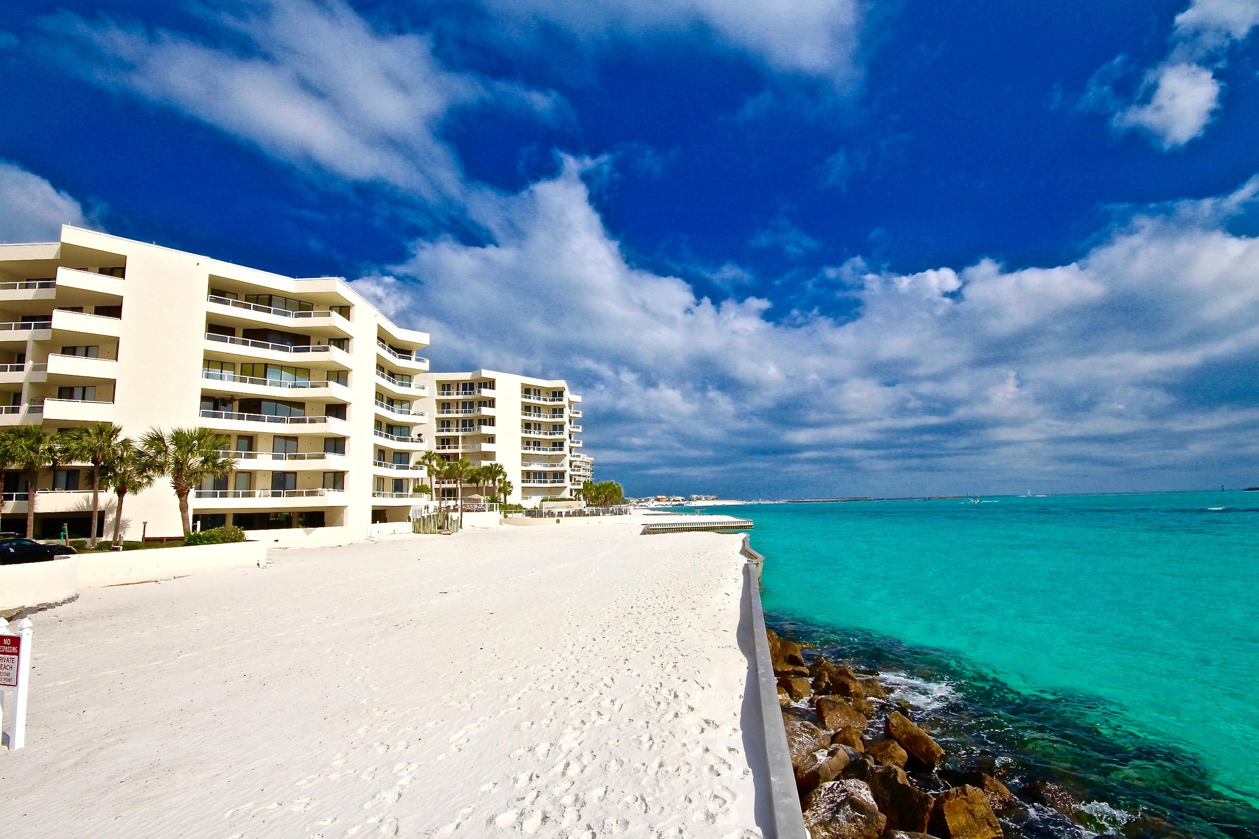 Rare find on Holiday Isle at East Pass Towers in Destin, Florida! This was the original developers hideaway and is a unique opportunity for the savvy investor to pick up a Studio in a prime location for a great price. The studio is tiled throughout with a full kitchen and plenty of room for a bed and sitting area as well as a tiled terrace with views of the Gulf toward the East Pass. This property could be joined with a boat slip to offer the utmost convenience for someone looking for the ultimate boating lifestyle out of the Destin Harbor. The property features a beach area and is adjacent to the beautiful Norriego Point. Hop on the water taxi and head over to all of the Harbor Restaurants without ever stepping in a car. Property is gated, secure and also has a beach front pool.