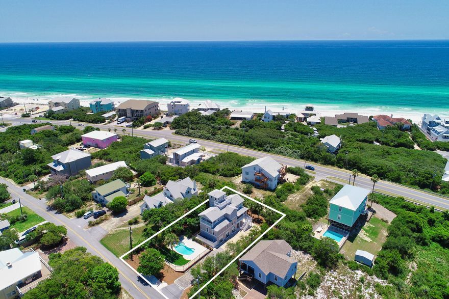 Featuring panoramic gulf views, this newly renovated home is ideally located on 30A in the community of Beach Highlands. Expansive outdoor space with a swimming pool, multiple private decks, and a roof terrace, as well as a spacious and welcoming floor plan allow for ample space for family gatherings. The first floor hosts its own lockout space with 2 bedrooms, 2 bathrooms, and a kitchenette. The second floor is anchored by an open kitchen, living room, and dining room, as well as featuring a guest master suite. The third floor is highlighted by a spacious master suite, complete with gulf views from its own private balcony, as well as spacious guest room with an en suite bathroom and private balcony. The fourth floor is home to a charming bunk room and access to the roof terrace to take in both sunrise and sunset along 30A.