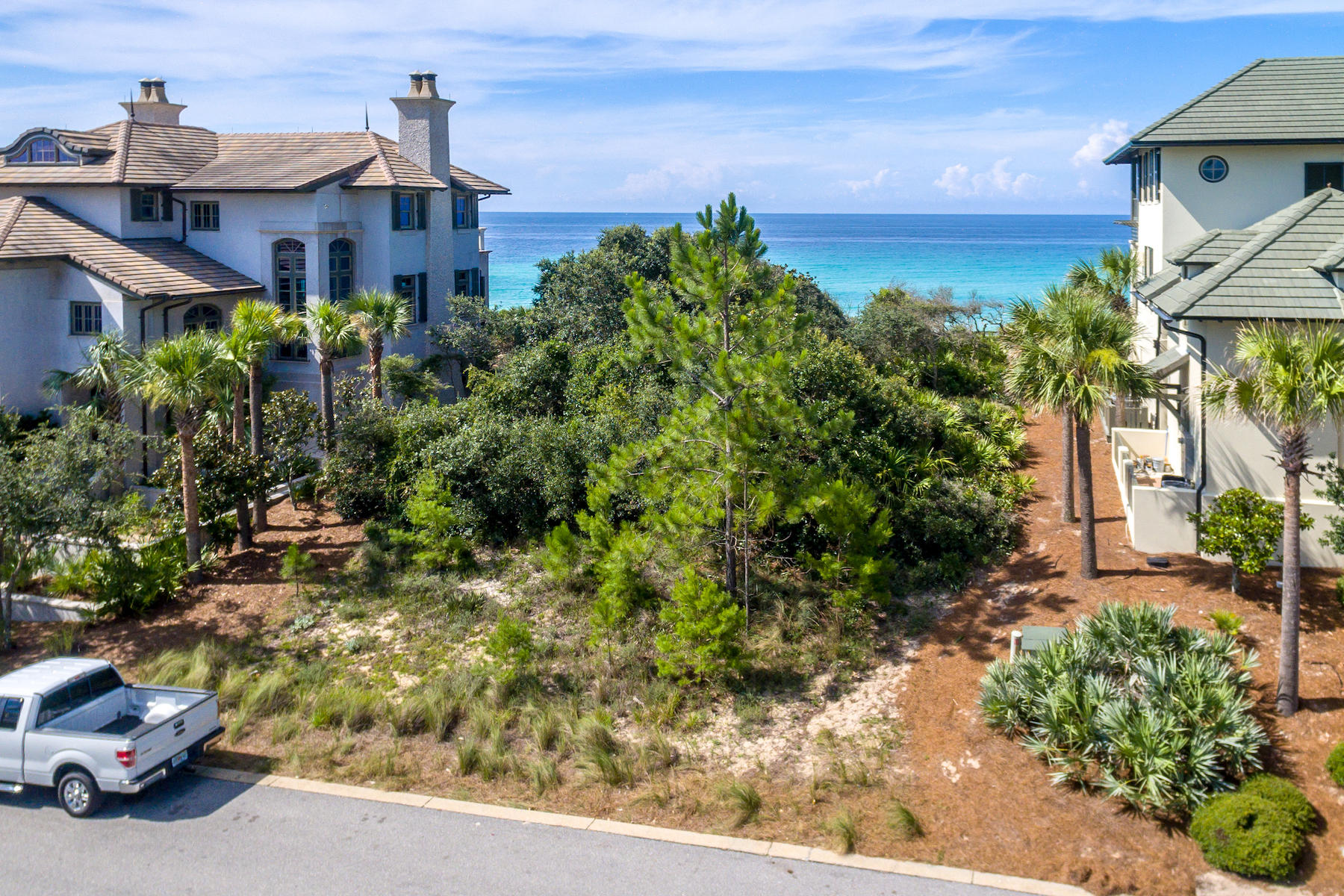 Tranquil, serene, stunning, spectacular, and breathtaking are just a few words that describe the views from this 70' wide GULF front first tier lot located in The Retreat. Build the beach home you've always dreamed of enjoying on this amazing lot. This secluded community south of 30A is gated with a guard, rental restricted, has 3000 feet of protected beach frontage with 4 beach accesses, sits on a high elevation, wraps around a rare coastal dune lake, and is nestled behind a 90 acre nature preserve. Owners have access to the gulf front Beach Club with infinity pool, sun deck, restroom pavilions and indoor lockers. There is also a canoe launch and picnic pavilion at Draper Lake. Previous owners had approved HOA and DEP Plans. Approved plans are included in sale.