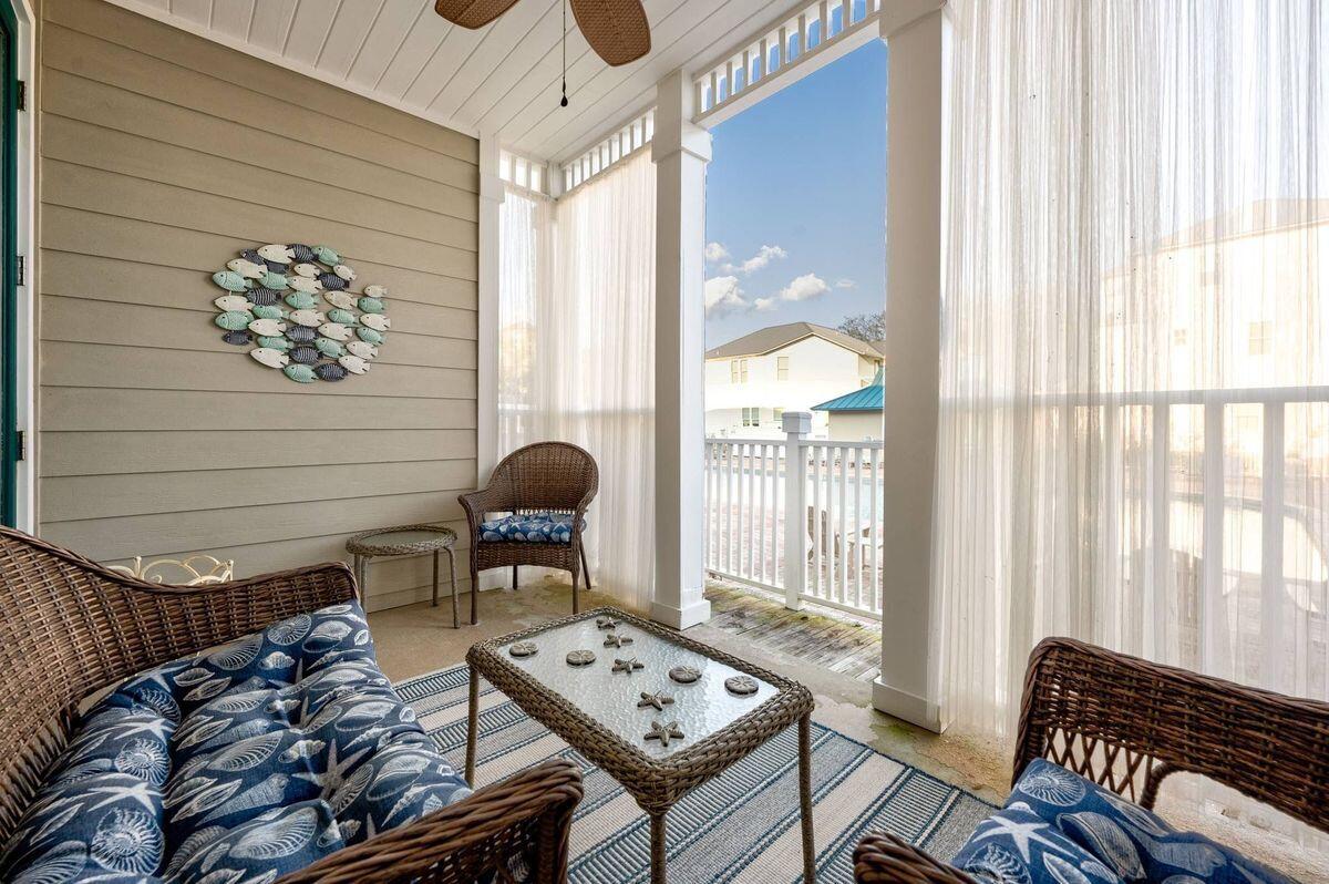 All one level first floor unit where you can walk out the door to the community pool from your covered porch and enjoy the pool.  This gated community has workout facilities and is walking distance to several restaurants One of them is the new Mimo's Italian restaurant . There are also  coffee and ice cream shops, making this a  perfect spot for family vacations on 30A.   Plus the beach access is not far for easy biking, walking  or an enjoyable golf cart ride. The community offers a lot of parking for you and your guests  The condo has been tastefully decorated and is being sold totally furnished with very few exceptions.