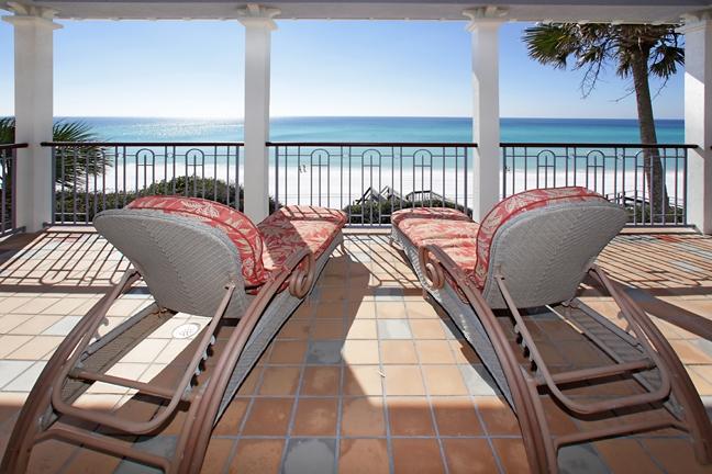Sitting atop a high bluff in a quiet natural setting, this custom built home offers endless views of the Gulf and a level of privacy seldom found at the Beach. Relax outdoors on any one of the multiple balconies, swim in the pool, or slip away onto the sugar white sand via the walkover. Inside is a host of dramatic architectural features, including walls of windows and glass doors bringing the breathtaking Gulf views in. The living room is a perfect blend of casual elegance and style with raised ceilings,tall glass windows and doors for natural lighting, warm wood floors, gas fireplace flanked by a custom entertainment center plus sitting area opening to a wrap-around, deep porch with powder coated aluminum railings. The Gourmet kitchen features new granite countertops,