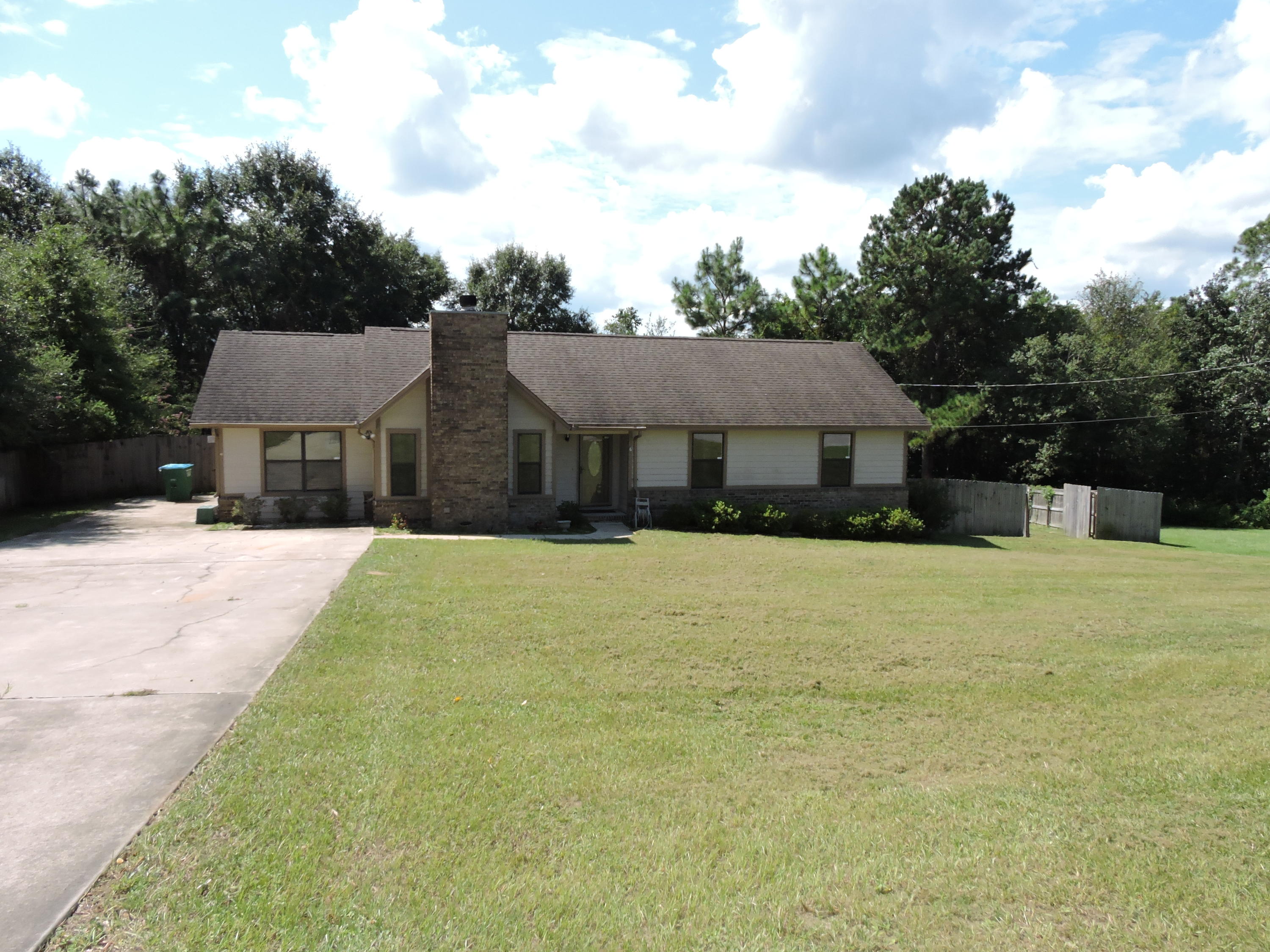 Well Maintained 3 bed/2 bath conveniently located South of I-10 between PJ Adams and Old Antioch Rd. The home is situated on a large .41 acre lot on a cul-de-sac with additional driveway poured to accomodate a RV or Boat. The home features beautiful wood flooring throughout with tile in the bathrooms. Relax in the morning/evening under the 14x50 screened in porch (with access from the dining area and master bedroom) overlooking a nature area behind the property. The garage has been tastefully converted into an additional living room/office/kid playroom with a large laundry room. The master suite features dual vanities and stand up shower with ample closet space. Call today for personal showing!