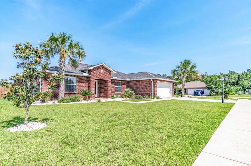 Sitting on a flat, corner, 1/2 acre lot, this beautiful home offers plenty of room for you to park your boat or RV in a stunning neighborhood complete with sidewalks! Walking into this home, you will notice the abundance of upgrades, open floorplan, and hand scraped engineered hardwood floors throughout. The large master suite offers plenty of room for a king size bed, a double vanity, soaking tub, and a large tiled shower. The open kitchen features ample cabinet space, stainless steel appliances, and granite countertops and backsplash. Head out back and you are greeted by a large backyard with playset and firepit that are included in the sale of the home as well as the washer and dryer for your convenience! Buyer to verify all details deemed important. Schedule your viewing today!