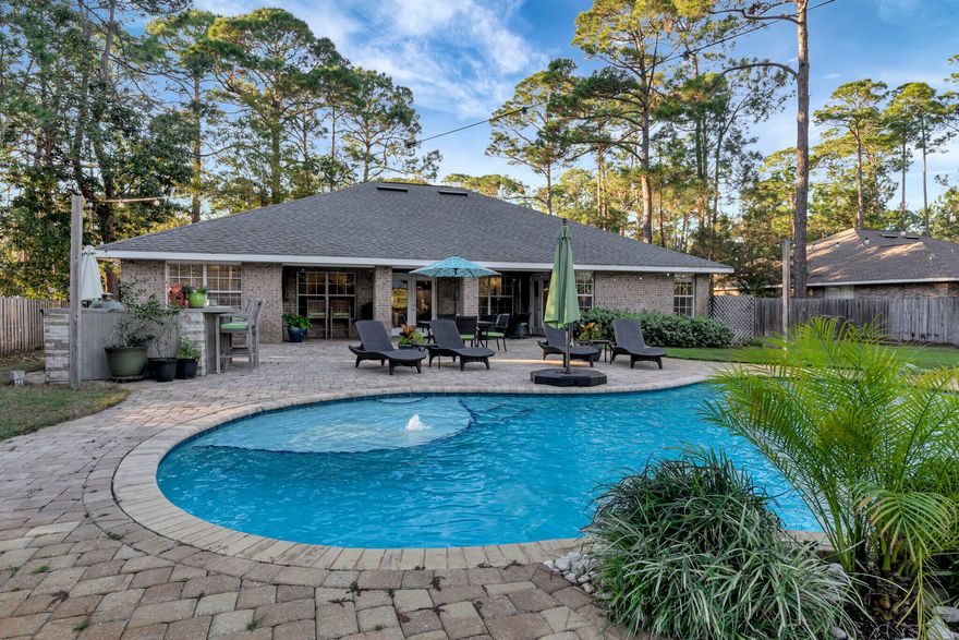 NEW IMPROVED PRICE! Welcome to 66 Driftwood Point Road, where luxury meets comfort in this exquisite 4-bed, 2-bath brick home. Nestled on one of the largest lots in the esteemed Driftwood Estates, this property offers unparalleled elegance and functionality.Upon entering, you are greeted by a remodeled kitchen that will delight any culinary enthusiast. Adorned with quartz countertops, stainless steel appliances, and a ceramic tile backsplash, this kitchen exudes sophistication and modernity. Hardwood flooring flows seamlessly throughout the foyer, kitchen, and living room, enveloping you in warmth and charm.Entertain guests in the formal dining room, exuding an air of refinement and grace. Retreat to the master suite, where luxury knows no bounds.