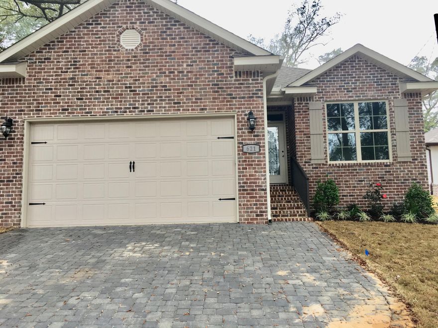 BRAND NEW HOME: As you drive up to this beautiful 3 bedroom 2 bath brick home you will just love the driveway that has beautiful stone pavers. This home has gorgeous oak trees in front and back yard.
Yard is beautifully landscaped with Zoysia grass. This home has a very roomy living room for lots of entertaining. The kitchen has beautiful cabinetry and granite countertops. Adjacent to the kitchen is a large dining area. Back porch has covered lanai. Master bedroom has a gorgeous tray ceiling and large walkin closet. Make this fabulous home yours today. Buyer to verify all measurements deemed to be accurate.