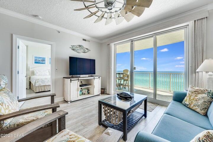 Best of the best in Emerald Isle! You'll fall in love with this 8th floor corner location - views for days! This perfect, beach inspired Gulf front 2/2 condo at Emerald Isle is the beach getaway you have always dreamed of! Low floor elevation is always in high demand by both owners and tenants! Sunshine and warm gulf breezes abound from HUGE (10X28) BALCONY offering panoramic views as far as you can see to the East and West and providing the ultimate alfresco living and entertaining environment. This unit boasts one of the biggest balconies in a 2/2 on the beach, offering world-class water and beach views! Inside, riveting Gulf views are framed by immaculate interiors, designed with the Gulf of Mexico and sun in mind.