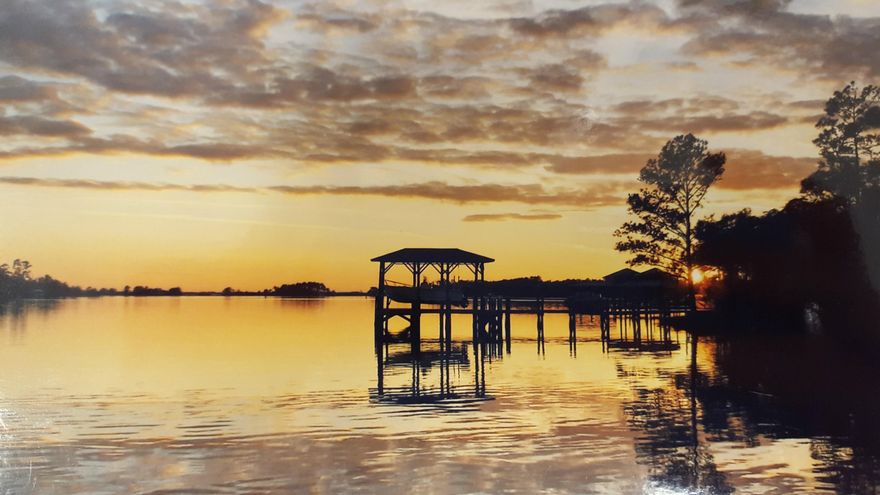 LIVE THE GOOD LIFE! PEACEFUL & TRANQUIL SETTING FOR THIS 1 OWNER HOME ON INTERCOSTAL WATERWAY OF LAGRANGE BAYOU! HOME IS LOADED W/ SO MANY AMENITIES THAT I HAVE LISTED THEM SEPARATELY, DOCUMENT IS ATTACHED TO THE LISTING OR CALL ME FOR A COPY. JUST TO MENTION A FEW: 20'X50'DEEP WATER BOAT DOCK W/ WATER & ELECTRIC; 728SF WORKSHOP W/ HVAC (INCLUDED IN SQ FT); 4' LIGHTED CRAWL SPACE UNDER ENTIRE HOME W/ POURED SLAB, DRAINS & OUTSIDE ACCESS SUPPORTS HOME WITH 5 CONCRETE FILLED PIERS, ENTIRE FLOOR IS INSULATED, 3 CAR GARAGE; HURRICANE SHUTTERS; WHOLE YARD BEAUTIFULLY FENCED AND HAS NATURAL SETTING; LARGE 22'X 35' LANAI TO RELAX AND ENTERTAIN ON WHILE TAKING IN THE BEAUTY OF THE BAYOU! SQ FT TAKEN FROM TAX RECORDS. ALL DIMENSIONS & MEASUREMENTS ARE APPROXIMATE, BUYER TO VERIFY.