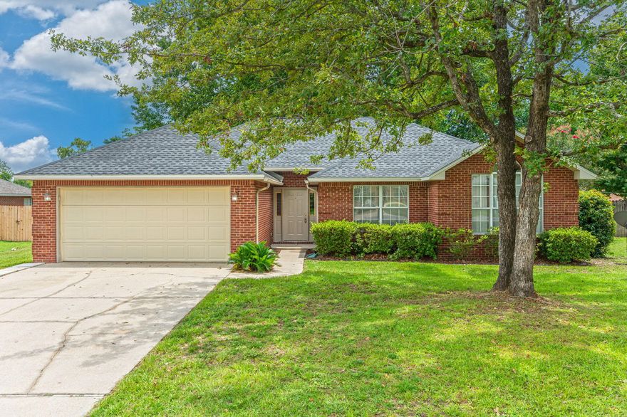 PRICE IMPROVEMENT!! Sellers to pay $5K toward Buyer's Closing Costs! Welcome home to 1224 Gabrielle Drive! Situated a large level lot in south Crestview, this property is located within minutes of both I-10 and military bases. The well maintained 3 bd/2 ba home boasts NEW LVP flooring throughout the entry, living room, dining room and bedrooms with tile in the remaining areas (2024). Additional updates include a NEW ROOF in 2023 and in 2024 fresh paint throughout, new countertops, new stove and microwave. The home features a spacious living room w/ wood burning fireplace, functional kitchen w/ both an adjacent breakfast area and formal dining room. The master suite boasts walk-in closet, dual vanities and large tub/shower combo. Additional bedrooms are a nice size. The backyard has a