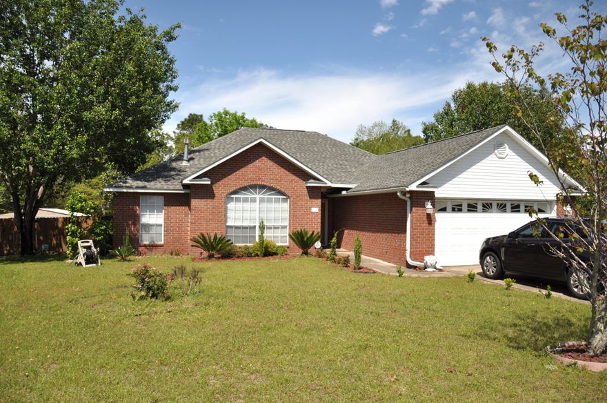 Lovely brick 4 bedroom, 2 1/2 bathroom home. Great floor plan with hardwood floors, family room, gas fireplace, formal dining room with double french doors, kitchen has stainless appliances and a breakfast nook. Master bedroom with patio access, master bath has double vanity, separate shower, tub and huge walk-in closet. Plenty of space to grill out on the patio deck or hangout in the screen room while enjoying your fenced backyard. Huge shed to store equipment. Situated on a quiet cul-de-sac street. No HOA fees. Conveniently located near hospital, shopping, restaurants, military base, interstate access & more. This home is the perfect combination of space, location & price!