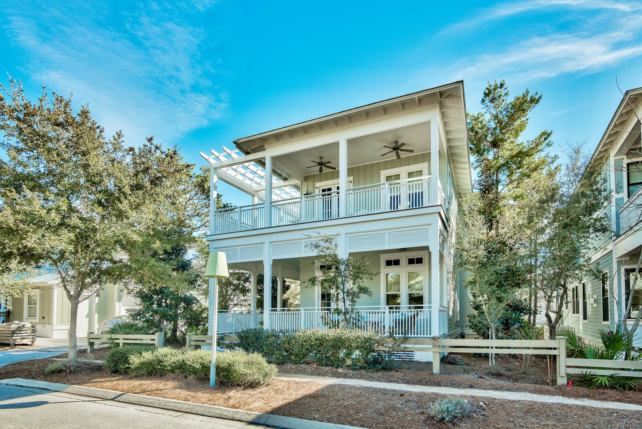 WaterColor Community, Envision Builders Group and Geoff Chick, Architect is a winning combination. This wonderful home has just finished a major expansion/renovation and was built as a private family residence - never been a rental. This 3,562 sq ft home is in the Oak Grove eastern edge of WaterColor Phase III, just steps from the Sand Hill Park & Pool, just over the pedestrian bridge to Town Center and the Beach Club. The home with its 12' ceilings, freshly painted nickel gap wood plank walls and 6'' plank wood floors welcome you to an open floor plan with an abundance of windows, screened in porches and is offered beautifully furnished. The 1st and 2nd floors guest suites, each with their own full bathrooms, an expandable two bed bunk room with its own half bath and