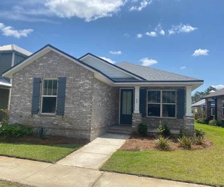 Lawn care and HOA fees included in the lease! Available for showing July 30th. Exceptionally maintained, like new, open concept home in Marina Village.  Wood look tile flooring throughout - no carpet. Granite countertops throughout. Mbath has a large walk in tile shower and separate garden tub.  All bedrooms are very spacious.  Kitchen has stainless steel appliances inc a refrigerator. Laundry has cabinetry storage and washer/dryer are included. Amenities include a pool, walking trails, sidewalks, playground, full service marina, dog park and more.  Walk to the amenities, the marina and The Oar House restaurant!