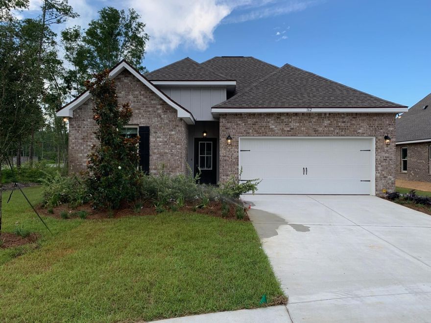 The CEDAR IV G in Wildflower at Hammock Bay community offers a 4 bedroom, 3 full bathroom, open design. Upgrades added (list attached).  Features: double vanity, garden tub, separate custom tiled shower with frameless door, and walk-in closet in the master suite, double vanity in 2nd bath, en suite bath in bedroom 2, kitchen island, walk-in pantry, covered rear patio, boot bench in mudroom, crown molding, recessed lighting, framed mirrors in all baths, smart connect Wi-Fi thermostat, smoke and carbon monoxide detectors, landscaping package, architectural 30-year shingles, flood lights, and more!Energy Efficient Features: water heater, kitchen appliance package with electric range, vinyl low E windows, and more!