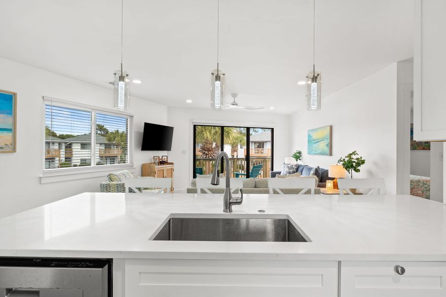 Fully furnished with $55,000 invested in stylish upgrades, plus brand-new windows and $20,000 in newly rebuilt stairwells and poolside decks -- this condo is completely move-in ready.Inside you'll find remodeled bathrooms, updated flooring, fresh paint, modern lighting, and newer appliances including hot water heater, dishwasher, and refrigerator. The unique octagonal floor plan creates an airy, open feel you won't find just anywhere.Overlooking one of two tropical pools (one heated year-round!), and just two blocks from the beach -- this is easy coastal living at its best.Welcome to Crystal Village in Miramar Beach-Come see today!