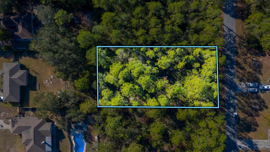 Ready to Build your dream home? Here is the lot you've been looking for!  This Lot features a  high and *mostly* dry in Holley by the Sea. Look no further!  At almost A1/2 acre, this is the ideal location for your new home to be built.  See wetlands study and survey for more information.