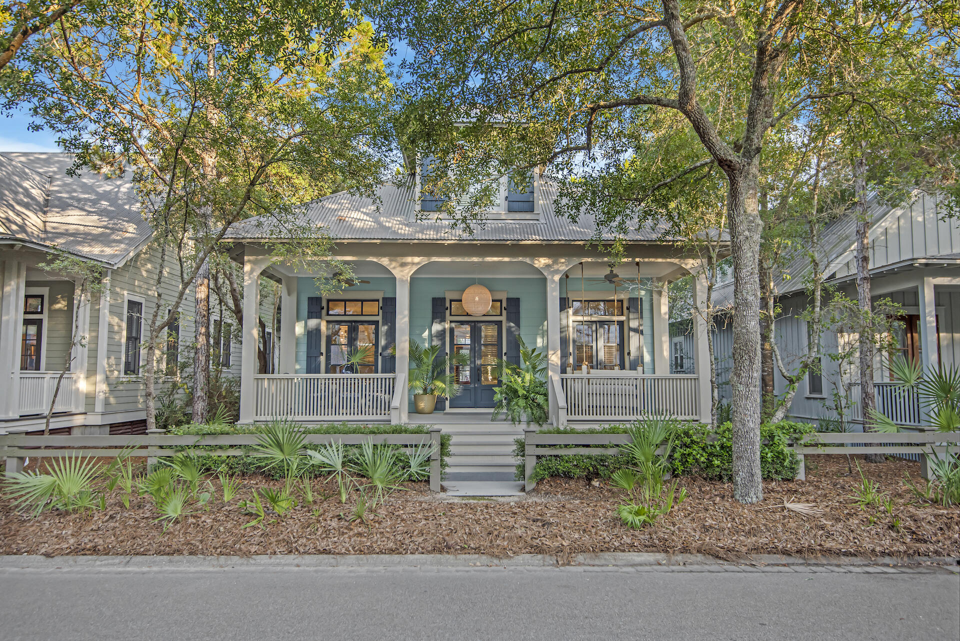 Discover the beach life at this adorable 3BR/3.5BA WaterColor cottage located in the sweetest spot! Directly across from Camp WaterColor, this immaculate home has never been rented and has newly painted interiors and exteriors along with designer high-end furnishings and light fixtures throughout. The welcoming covered front porch leads to the open living and dining areas with wide plank wood walls, beautiful pine hardwood floors, and built-in bookcases. The galley-style kitchen includes a large breakfast bar overlooking the dining area, quartz countertops, stainless steel appliances, and white wood cabinetry. The master bedroom and a guest bedroom are located on the first level each with ensuite bathrooms. The expansive third guestroom on the second level has been turned into the ultimate bunk room with sleeping for 10, plenty of space to play, and an ensuite bathroom. Outside, a paver patio features an outdoor shower for easy clean up from beach days, a pergola for parking, and a storage room for bikes and beach gear.
The special assessment for amenities has been paid in full on this property!
Located on 499 acres in the renowned South Walton beaches, the WaterColor community offers the charm of small-town life. Exceptional community amenities include six beautiful swimming pools, a recently renovated gulf front beach club, nature trails, a Boathouse offering kayaking, canoeing, and paddle boarding, a fitness center, outstanding tennis facility, Camp WaterColor for kids with lazy river and waterslide, parks, and green spaces.