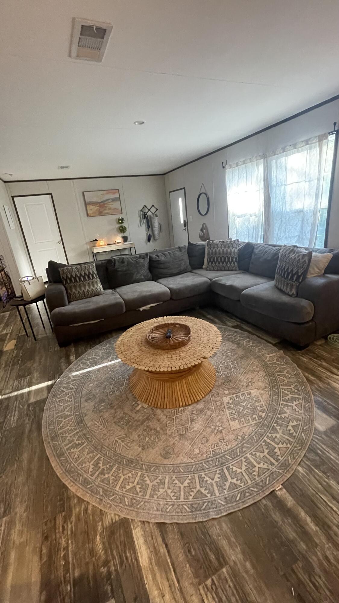 Let the country roads lead you to your new home! Schedule your appointment today to come view this 3/2 2022 mobile home. Plenty of outdoor space ready for your personal touch. All measurements are approximate.