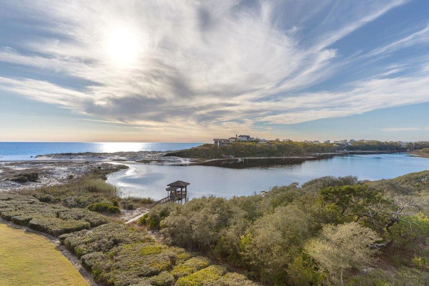 Discover an extraordinary gem along scenic Highway 30A--a 4-bedroom, 4.5-bathroom, two-story luxury condominium in the exclusive Sanctuary by the Sea community. Offering 3,163 sq. ft. of elegant living space, this stunning residence boasts unobstructed southwestern views of Big Redfish Lake and the Gulf from two expansive balconies, including a massive 22' x 38' second-level terrace. Located on the top 2 floors, this fully furnished home is designed for full-time living or a family beachfront retreat. With two waterfront master suites, an open-concept living/dining area, and a chef's kitchen featuring Viking appliances, granite countertops, custom cabinetry, double islands, and a separate beverage station, this residence is built for comfort and entertaining. Additional features include floor-to-ceiling windows and doors, 10-foot ceilings, and a spacious laundry room. Nestled between Grayton Beach State Park and Blue Mountain Beach, this exclusive 23-acre gated retreat offers unparalleled privacy and world-class amenities. Residents enjoy 650 feet of private beach access, three resort-style pools with waterfalls, fountains, hot tubs, and zero-entry access, as well as outdoor gas fire pits and grilling areas. A boardwalk and dock on Big Redfish Lake provide the perfect setting for fishing, kayaking, and paddleboarding. The community also features a golf simulator, fitness center, a theater room, and hot tubs. With 24-hour security, this is a private and peaceful oasis just minutes from WaterColor and Seaside.