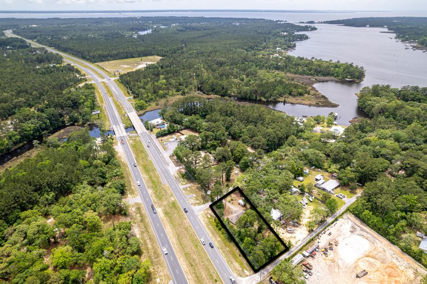 Endless possibilities on this 1/2 acre lot with a well maintained 4 bedroom and 2 bathroom home.  The ranch style home has stainless steel appliances, tile, and large backyard. There is plenty of room to add additional building to connect to home for business purposes. The lot also features a large 12 by 20 shed with electricity. This quiet one street neighborhood with NOA and a large yard for boat, rv and more. This is zoned Rural Village with possibilities for Live/Work, artisanal, office use, etc.  This location can't be beat with average annual daily traffic of 29,000 vehicles per day the 200 feet of 331 frontage is ideal business opportunity. As a primary residence a short 12 mile drive to the beach, 1 mile to Publix and 3 miles to Bay.  Freeport has many new additions in the area such as T's Catch a local seafood market, Odd Pelican Brewery and much more